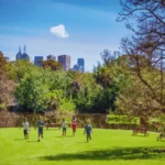 Picnic-under-trees-at-Royal-Botanic-Gardens-Melbourne-with-lake-view