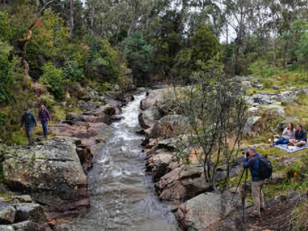 People enjoying Yackandandah Gorge Scenic Walk beside the creek
