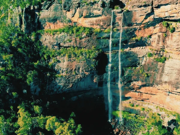 Full view of Dandongadale Falls, Victoria’s tallest waterfall, cascading down the cliff in the High Country