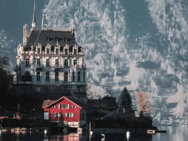 Traditional Swiss village near Lake Brienz covered in winter snow