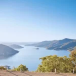 Full view of Lake Eildon National Park with blue water and surrounding hills in Victoria