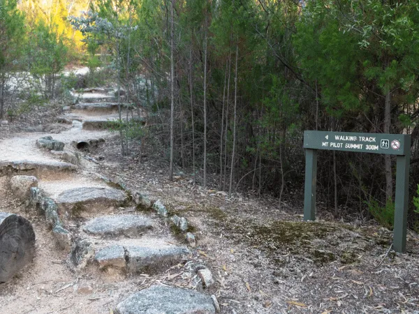 Stone steps and walking track sign on the Mt Pilot Lookout Walk in Chiltern, Victoria