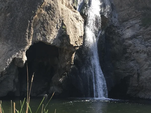 Close-up view of water flowing over the rock ledge at Paradise Falls in Victoria