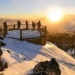 Sunset view from Mt Higgi Lookout at Mount Hotham with snow-covered alpine scenery