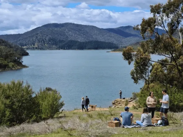 People enjoying the lakeside at Lake Eildon National Park in Victoria
