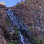 Detailed zoom-in image showing water flowing over the rocky steps of Jubilee Falls in Daylesford.