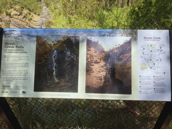 Signboard with distances and descriptions for Strath Creek Falls along the walking track.