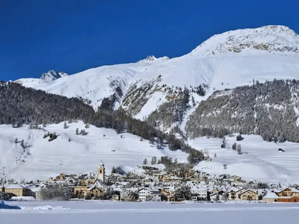 Snow-covered alpine village of Celerina near St. Moritz Switzerland