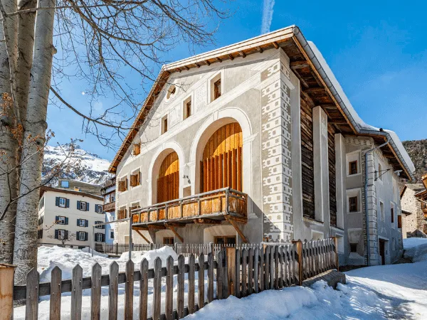 Historic building in Samedan old town with traditional Engadin architecture