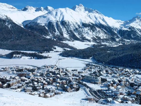 Snow-covered Samedan village in the Upper Engadin Valley, Switzerland