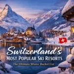 Snow-covered Swiss village and alpine lake with iconic mountains showcasing Switzerland’s most popular ski resorts in winter