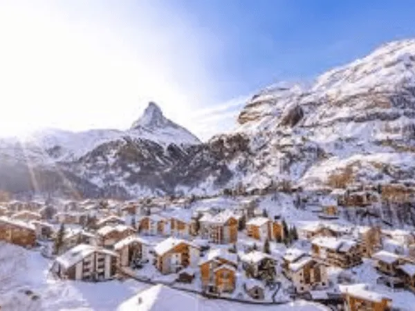 Zermatt Switzerland with charming alpine village, snowy mountains, and the iconic Matterhorn peak