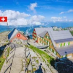 säntis-summit-buildings-swiss-flag-aerial-view