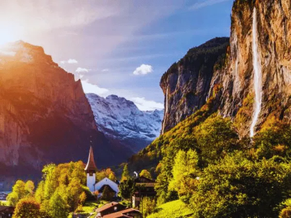 staubbach falls waterfall falling from a high cliff above lauterbrunnen village in switzerland