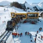 stoos ski resort with snow covered slopes and visitors in winter