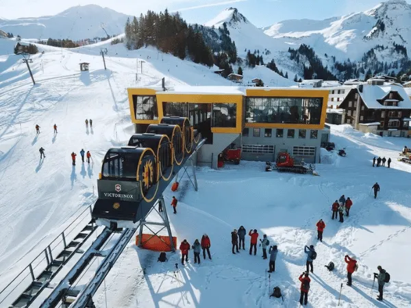 stoos ski resort with snow covered slopes and visitors in winter