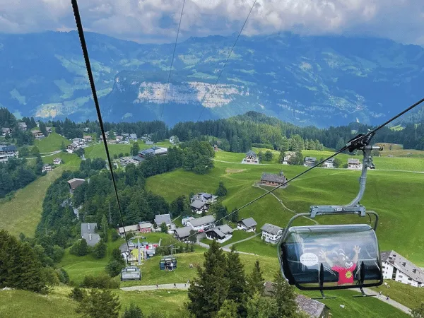 aerial view of stoos village with cable car and alpine landscape in switzerland