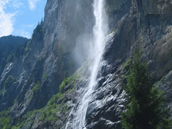 panoramic view of lauterbrunnen valley surrounded by mountains and waterfalls