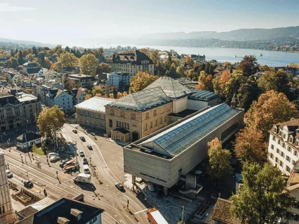 bird-eye-view-of-kunsthaus-zurich-museum-surrounded-by-autumn-trees-and-lake-zurich