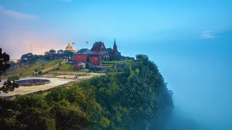 Bokor Hill Station temple perched on a misty cliff in Kampot