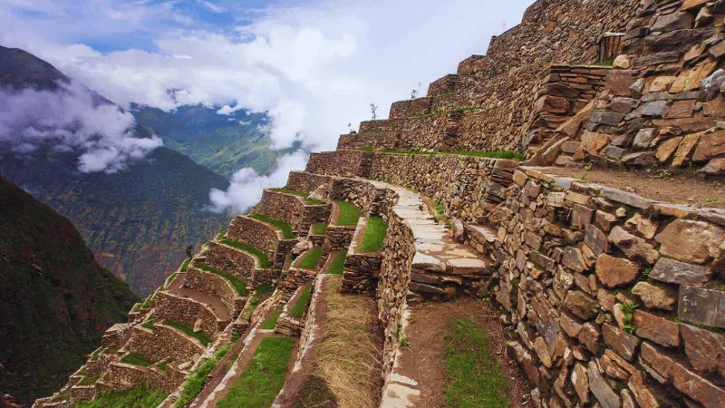 Inca stone terraces at Choquequirao archaeological site in Peru