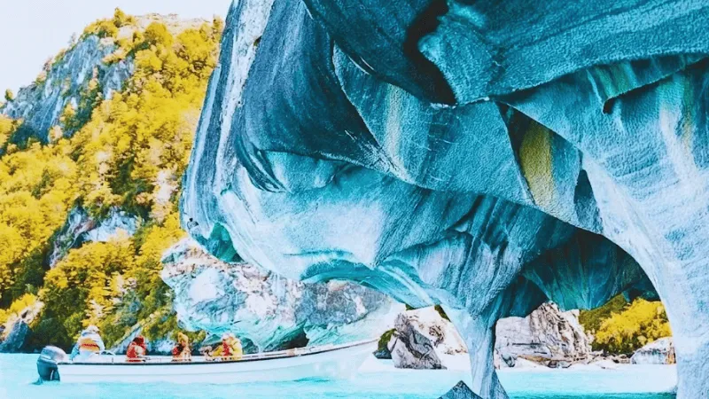 Boat tour under Marble Caves Chile rock overhang
