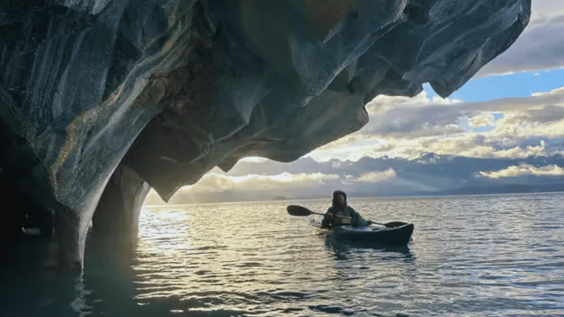 Kayaking Marble Caves Chile at sunset near cave entrance
