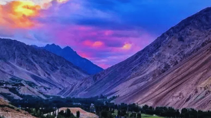 Sunset lighting the mountains of Phander Valley, Pakistan