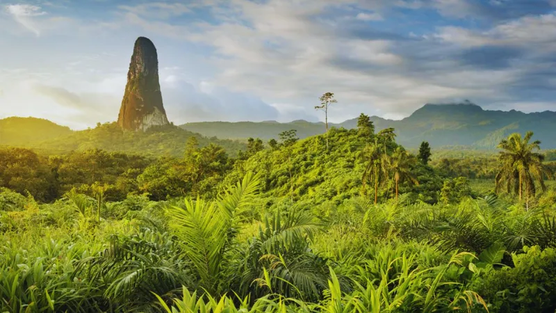 Pico Cão Grande volcanic peak surrounded by tropical jungle in São Tomé