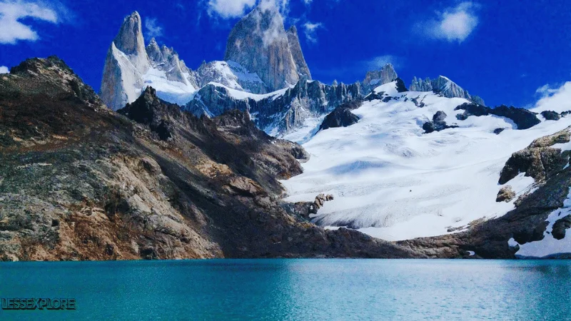 Mount Fitz Roy peaks above turquoise glacial lake in Patagonia
